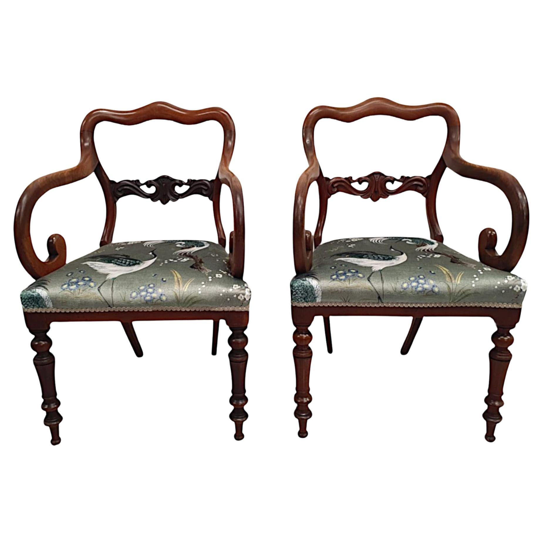 A Fine Pair of 19th Century Carver Armchairs