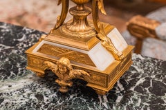 A fine pair of 19th century French  alabaster and gilt bronze lamps