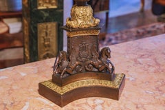 A fine pair of 19th century French Charles X period bronze candelabra lamps