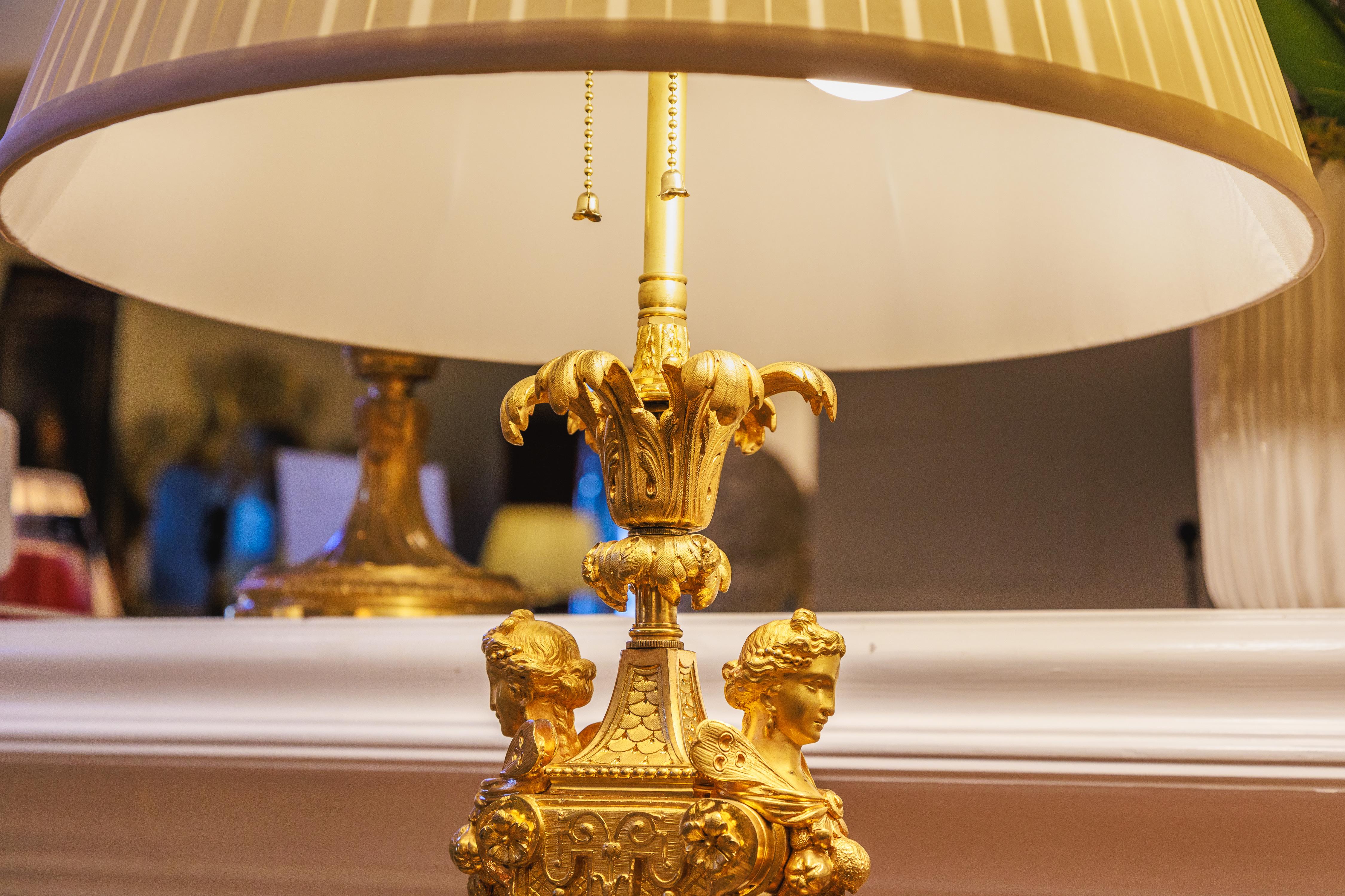 A fine pair of 19th century French gilt bronze cherub lamps In Good Condition In Dallas, TX