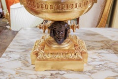 A fine pair of 19th century French large gilt bronze cherub lamps.