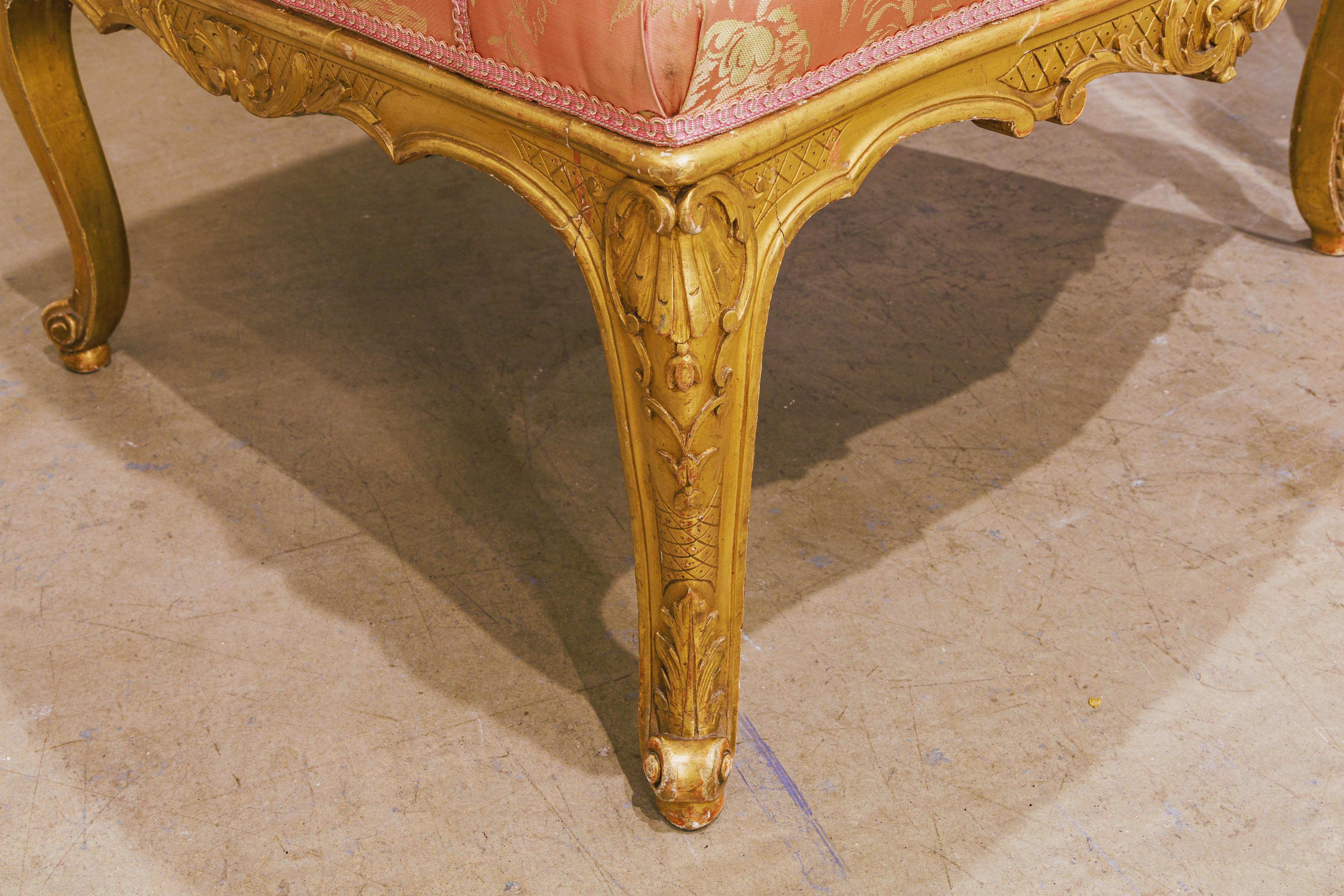 A very fine pair of Louis XVI gilt carved wing chairs. Fine detail and the original gilt . Large and comfortable