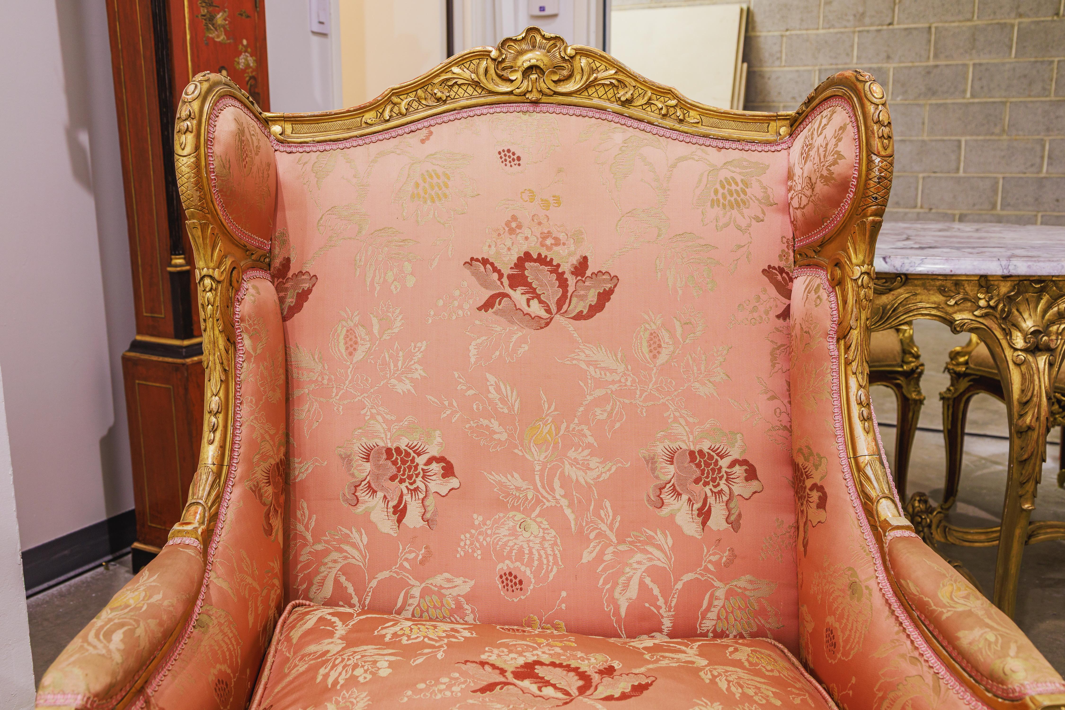 19th Century A fine pair of 19th century French  Louis XVI  gilt carved large wing chairs For Sale
