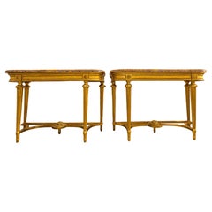 A fine pair of 19th century French Louis XVI gilt carved marble top consoles