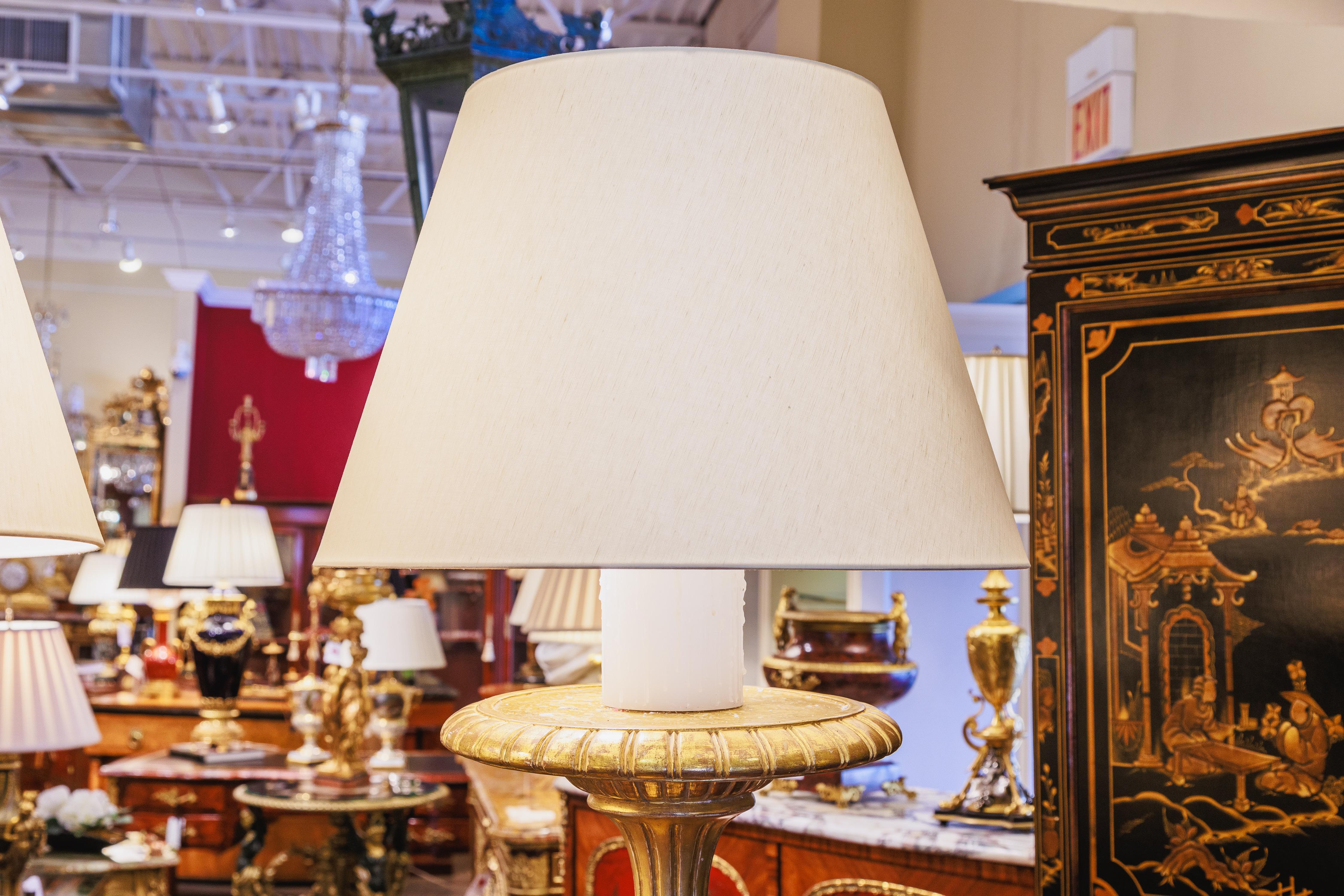 A fine pair of 19th century George 111 hand carved and gilt floor lamps . Fine gilding and carving 
