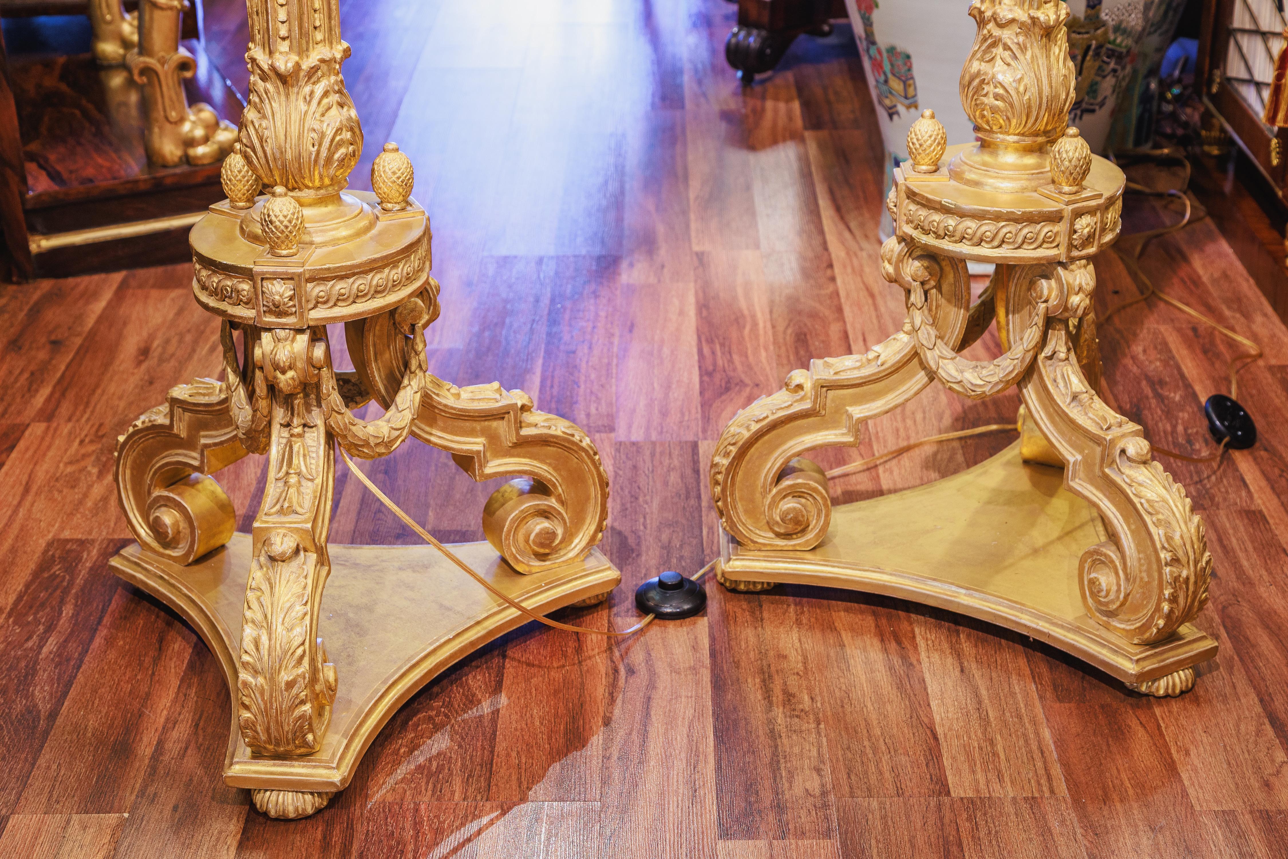 Bronze A  fine pair of 19th century George 111 gilt torchiere floor lamps For Sale