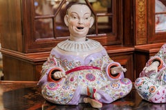 A fine pair of 19th century German porcelain large hand painted Nodders