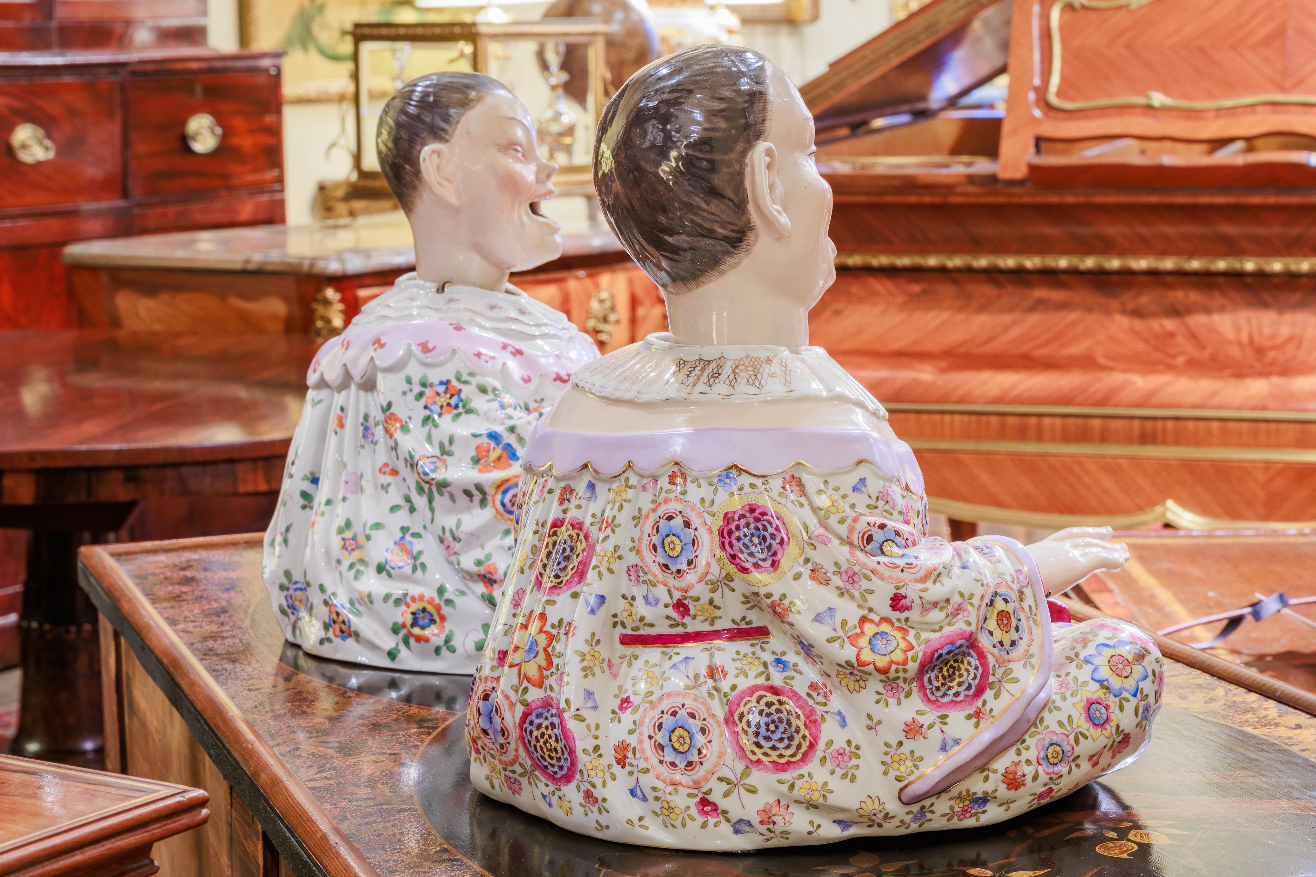 A fine pair of 19th century German porcelain large hand painted Nodders In Good Condition In Dallas, TX