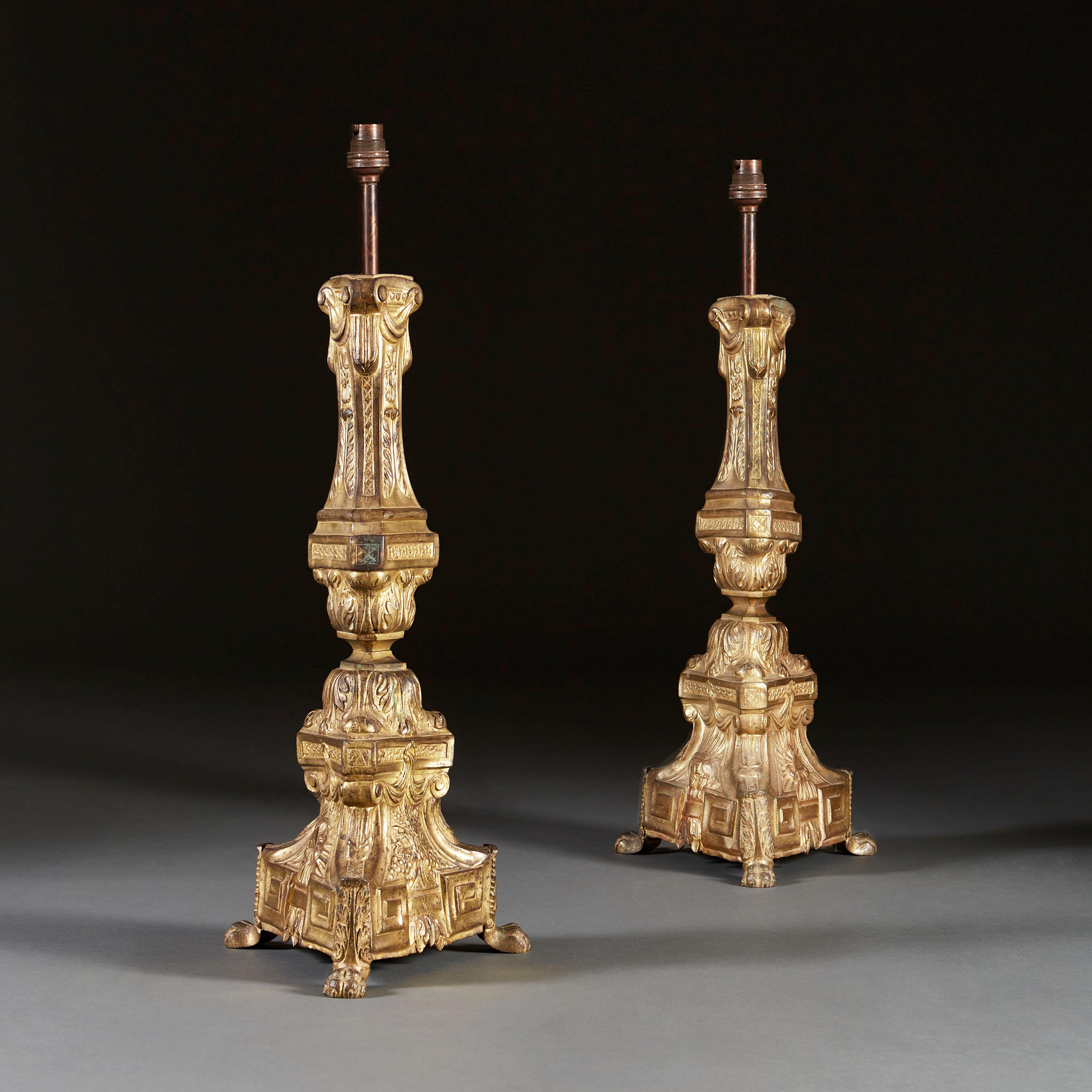 Italian A Pair of 19th Century Gilt Repoussé Candlesticks as Table Lamps