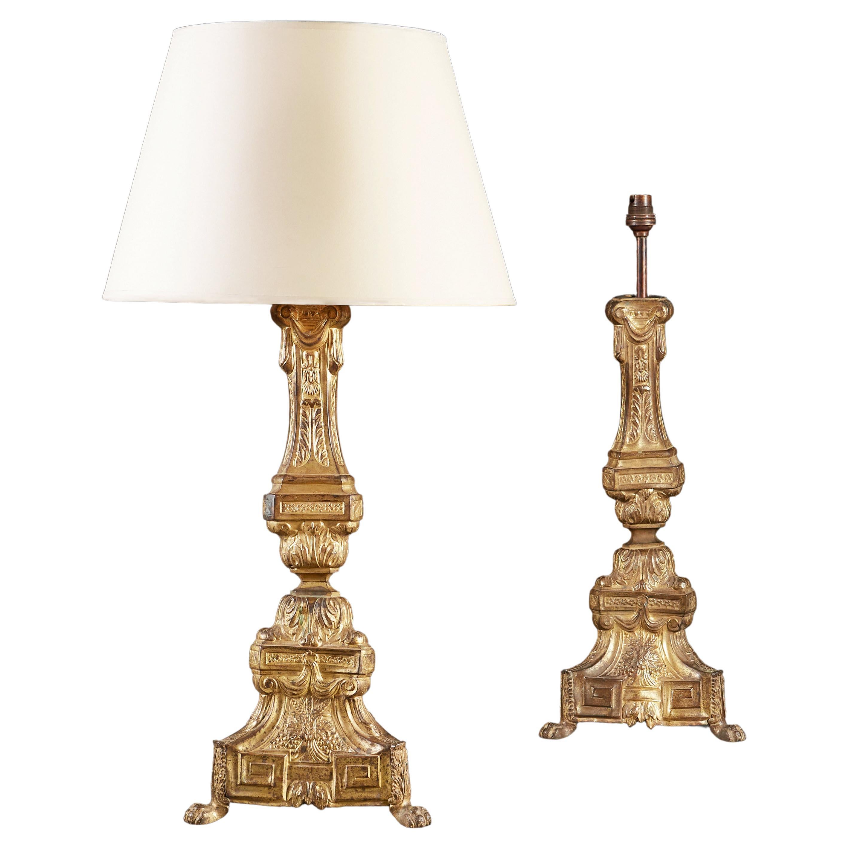 A Pair of 19th Century Gilt Repoussé Candlesticks as Table Lamps