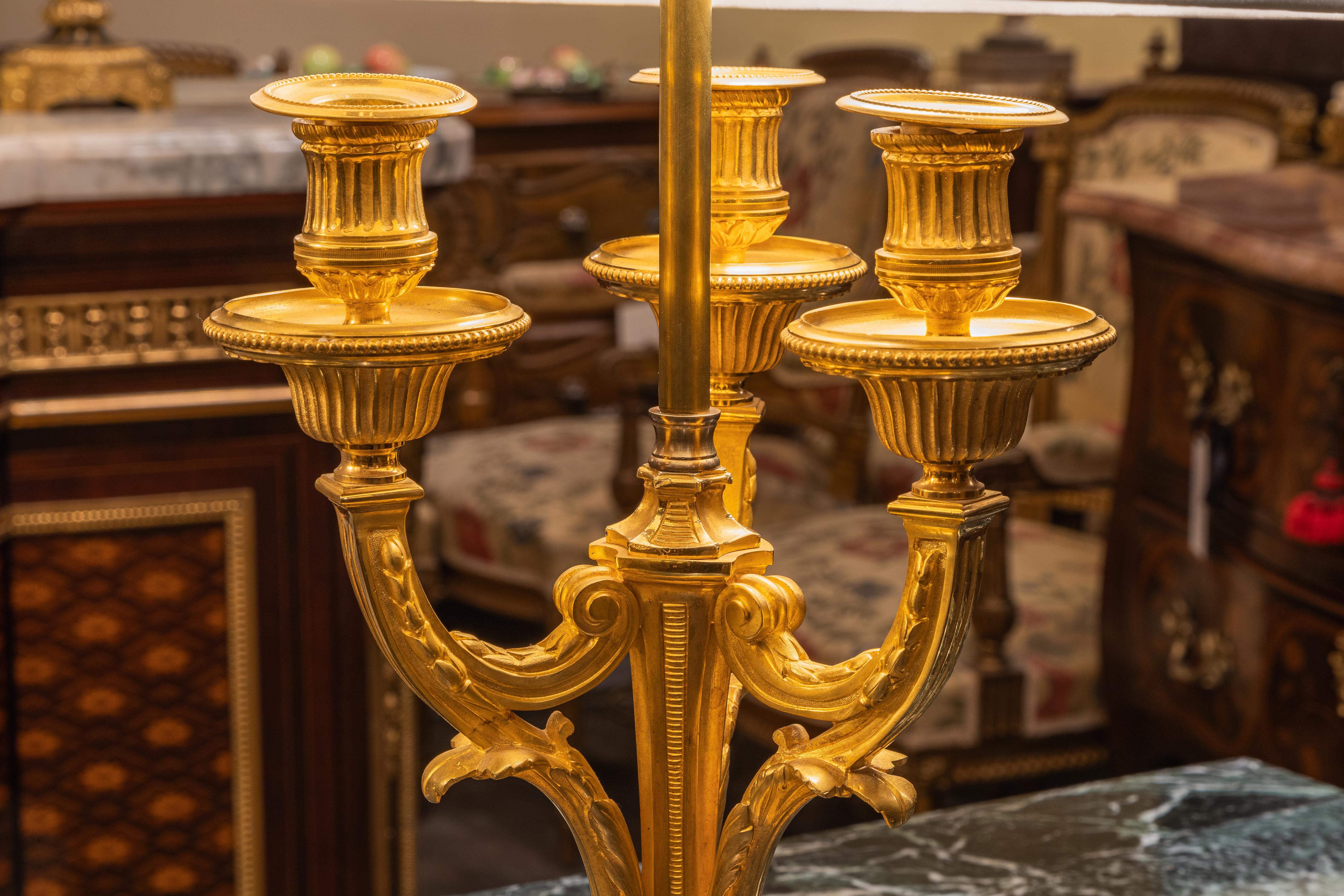 French A fine pair of 19th century Louis XVI gilt bronze candelabrum lamps  For Sale