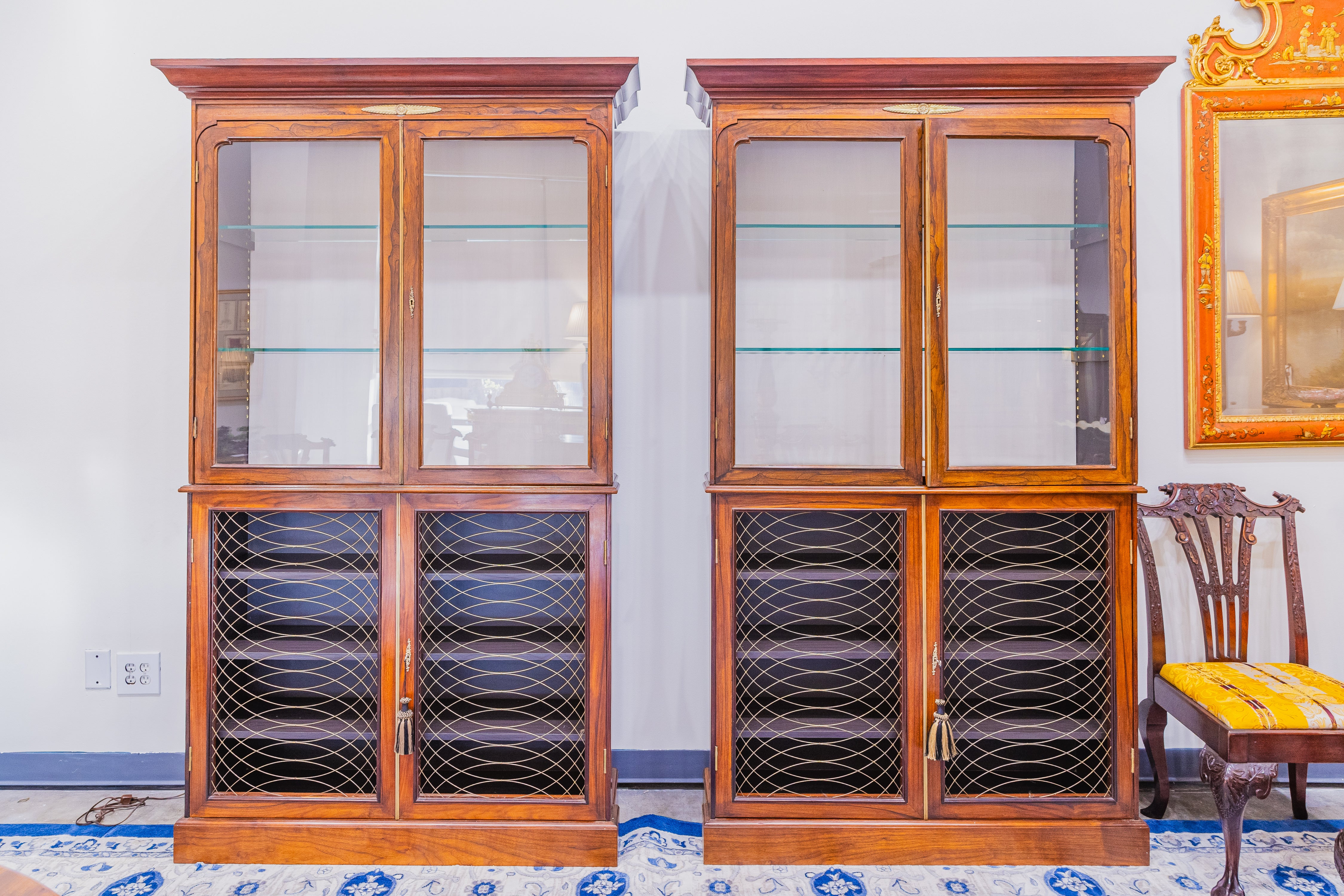 A fine pair of 19th century Regency rosewood and gilt bronze mounted bookcases