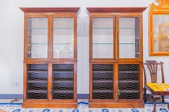 A fine pair of 19th century Regency rosewood and gilt bronze mounted bookcases