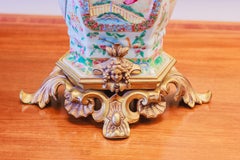 A fine pair of 19th century Rose Medallion and gilt bronze mounted lamps
