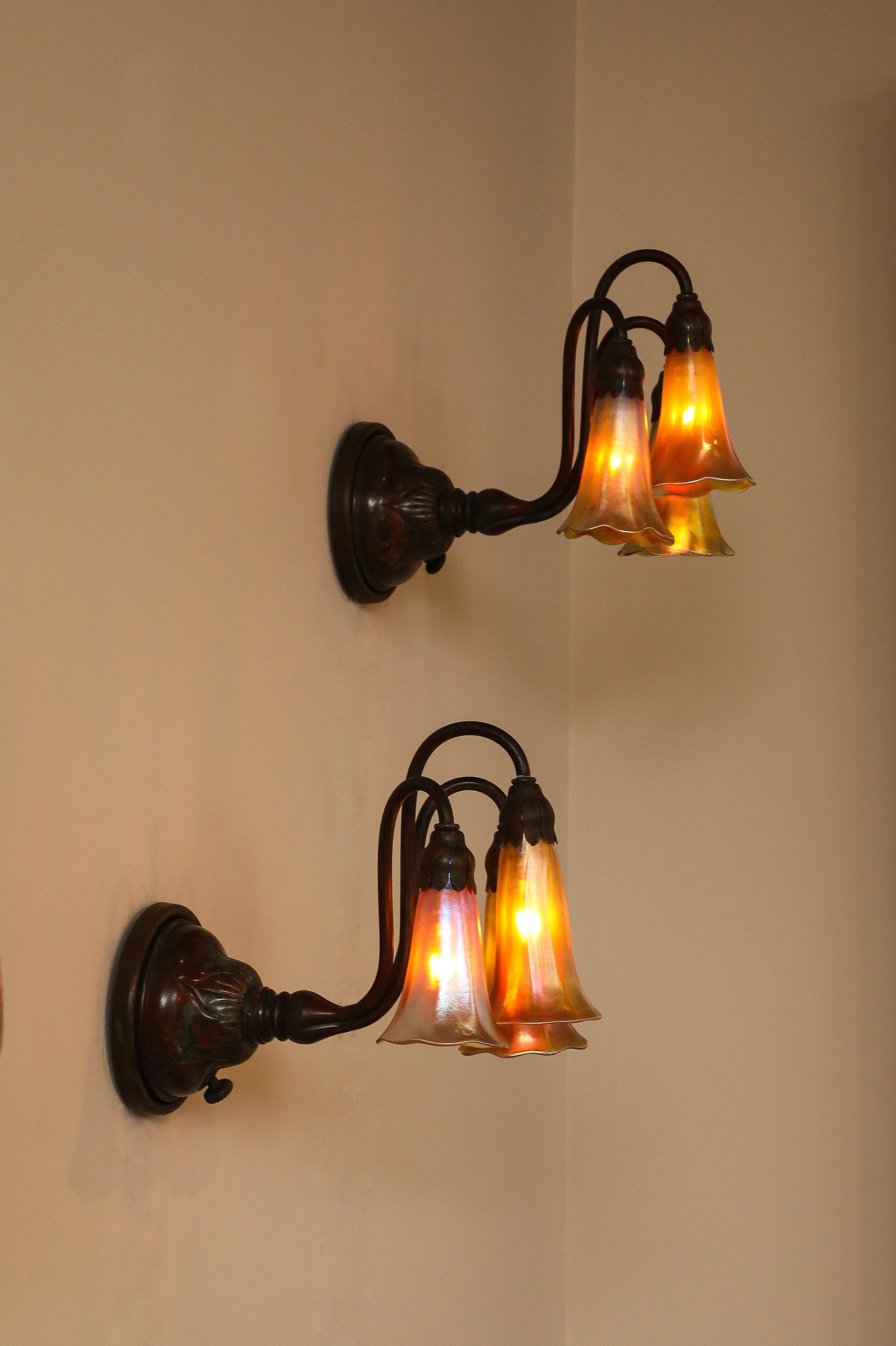 North American A Fine Pair of 3 Light Wall Sconces, by Tiffany Studios For Sale