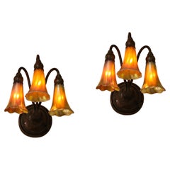 A Fine Pair of 3 Light Wall Sconces, by Tiffany Studios