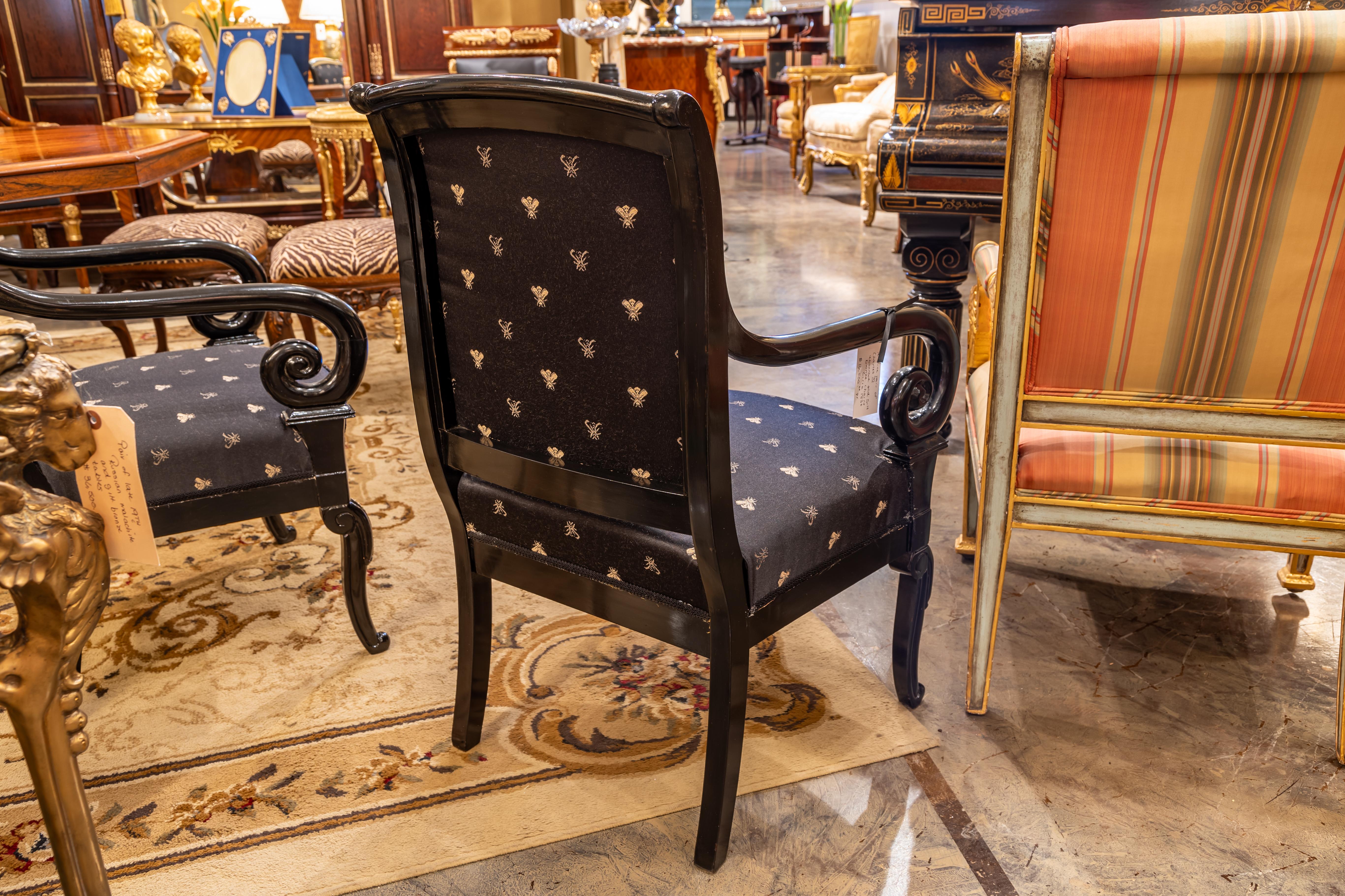 A fine pair of Charles X  ebonized and gilt bronze mounted fauteuils  In Good Condition For Sale In Dallas, TX