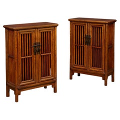 A Fine Pair of Chinese Elm Lattice Cabinets 