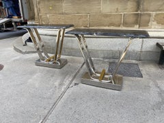 Fine Pair of Chromed Steel and Polished Brass Console Tables By Karl Springer