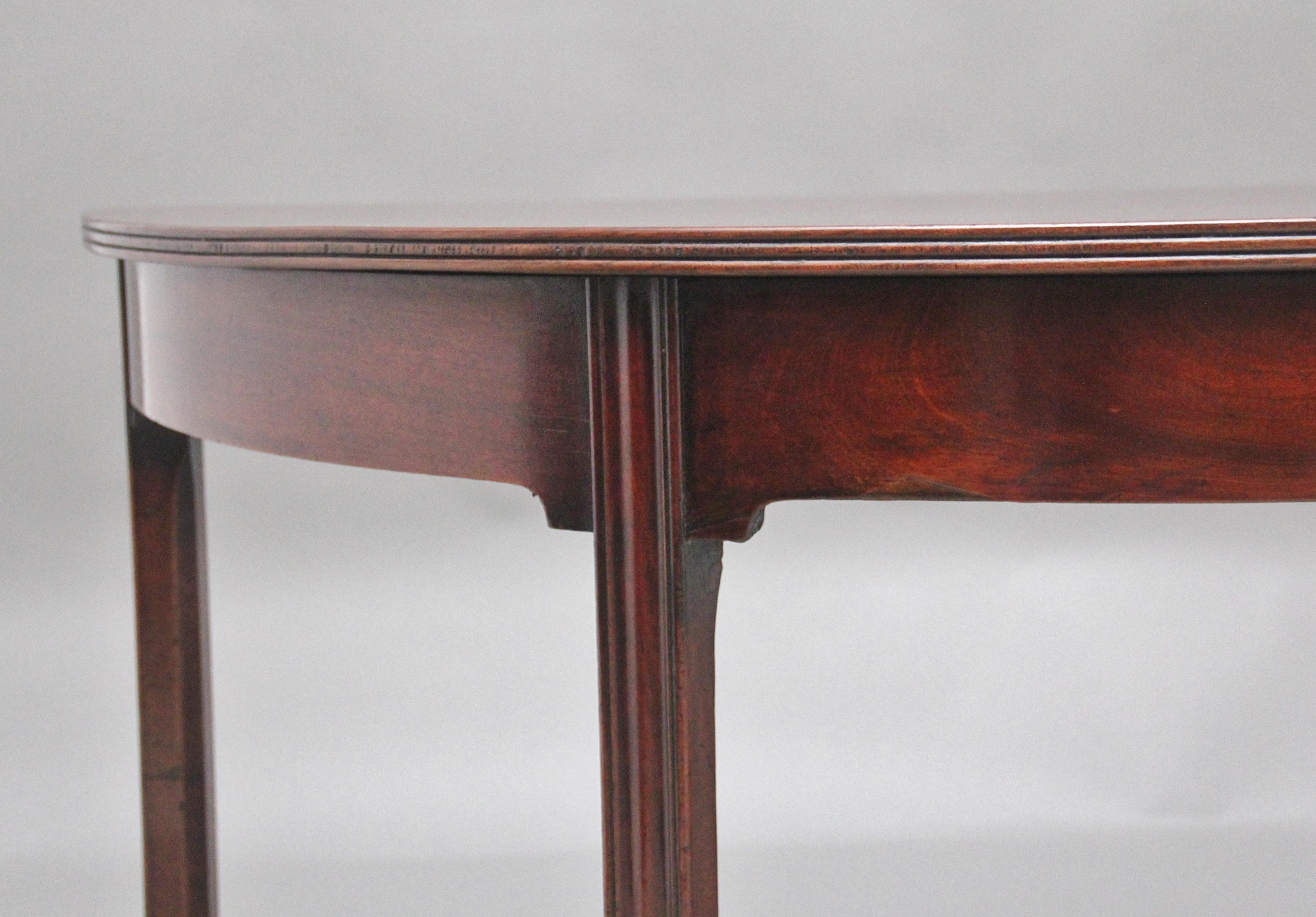 Mahogany A fine pair of early 19th Century mahogany demi-lune console tables For Sale