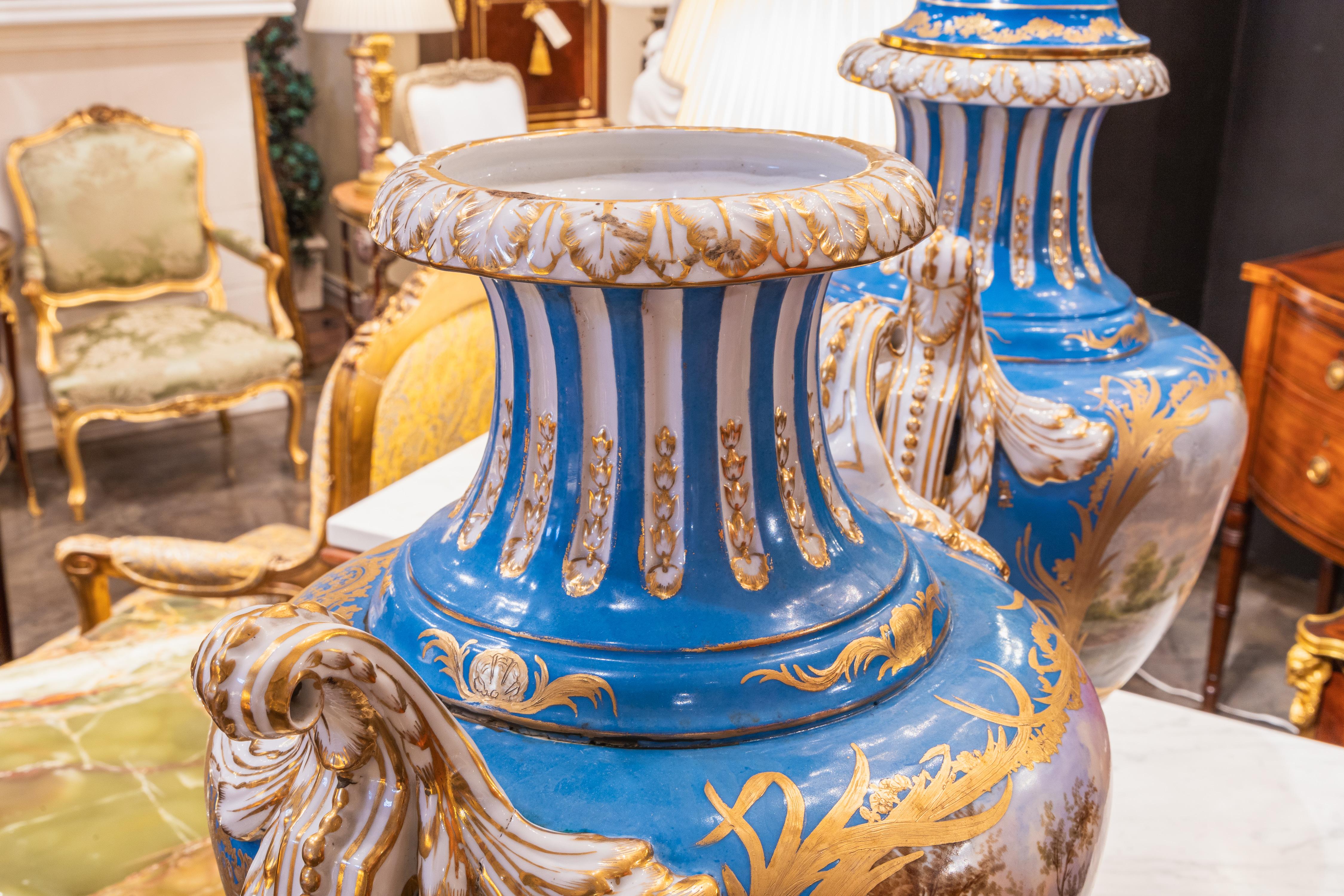 Porcelain A fine pair of early 20th c  Sevre's style celeste blue palatial porcelain vases