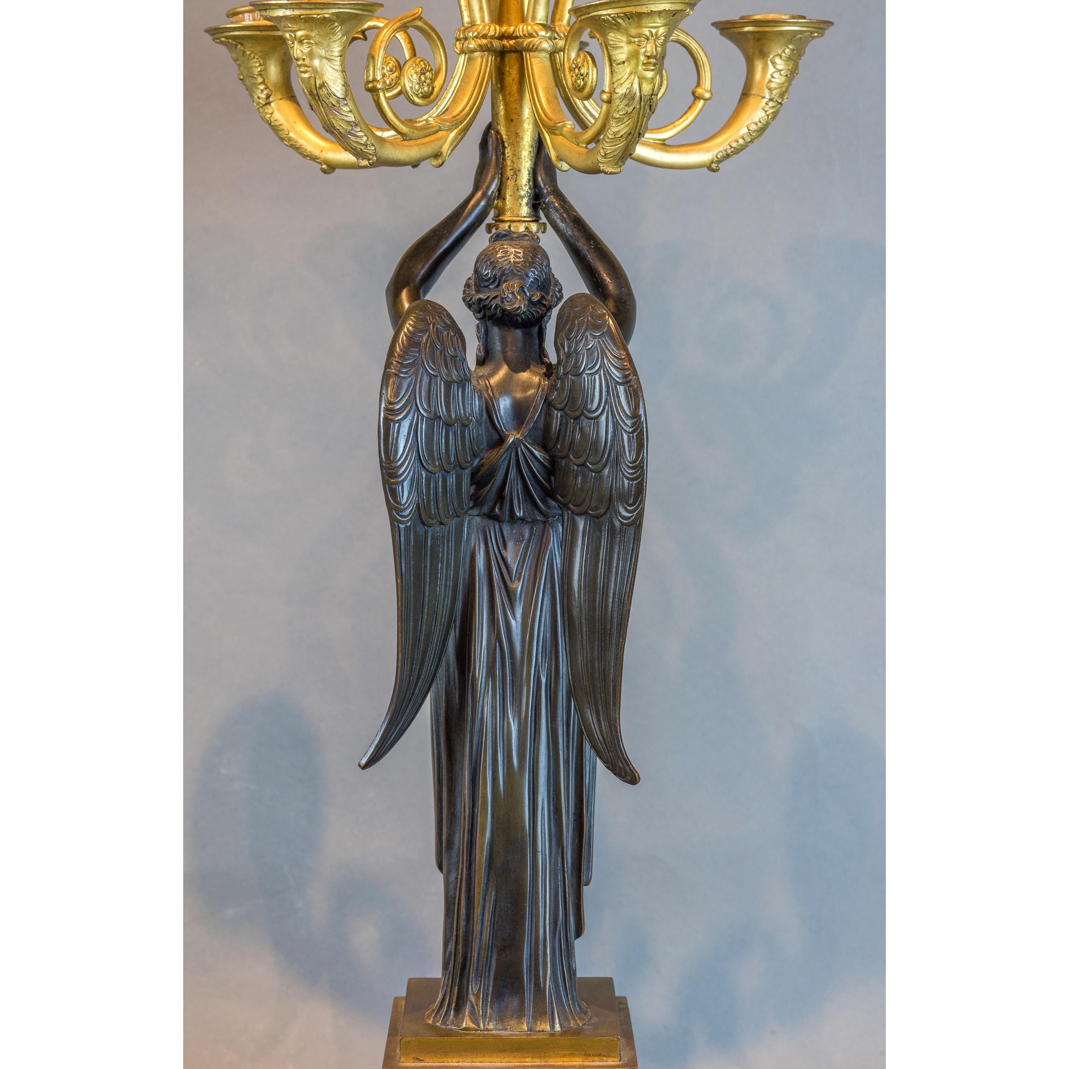  Pair of Empire Gilt and Patinated Bronze Six-Light Figural Candelabras In Good Condition For Sale In New York, NY