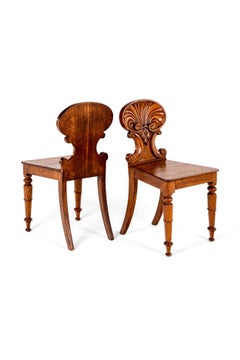 A Fine Pair of English Antique Shell Back Hall Chairs