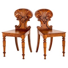 A Fine Pair of English Antique Shell Back Hall Chairs