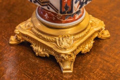 A fine pair of English Imari porcelain and gilt lamps. Custom shades