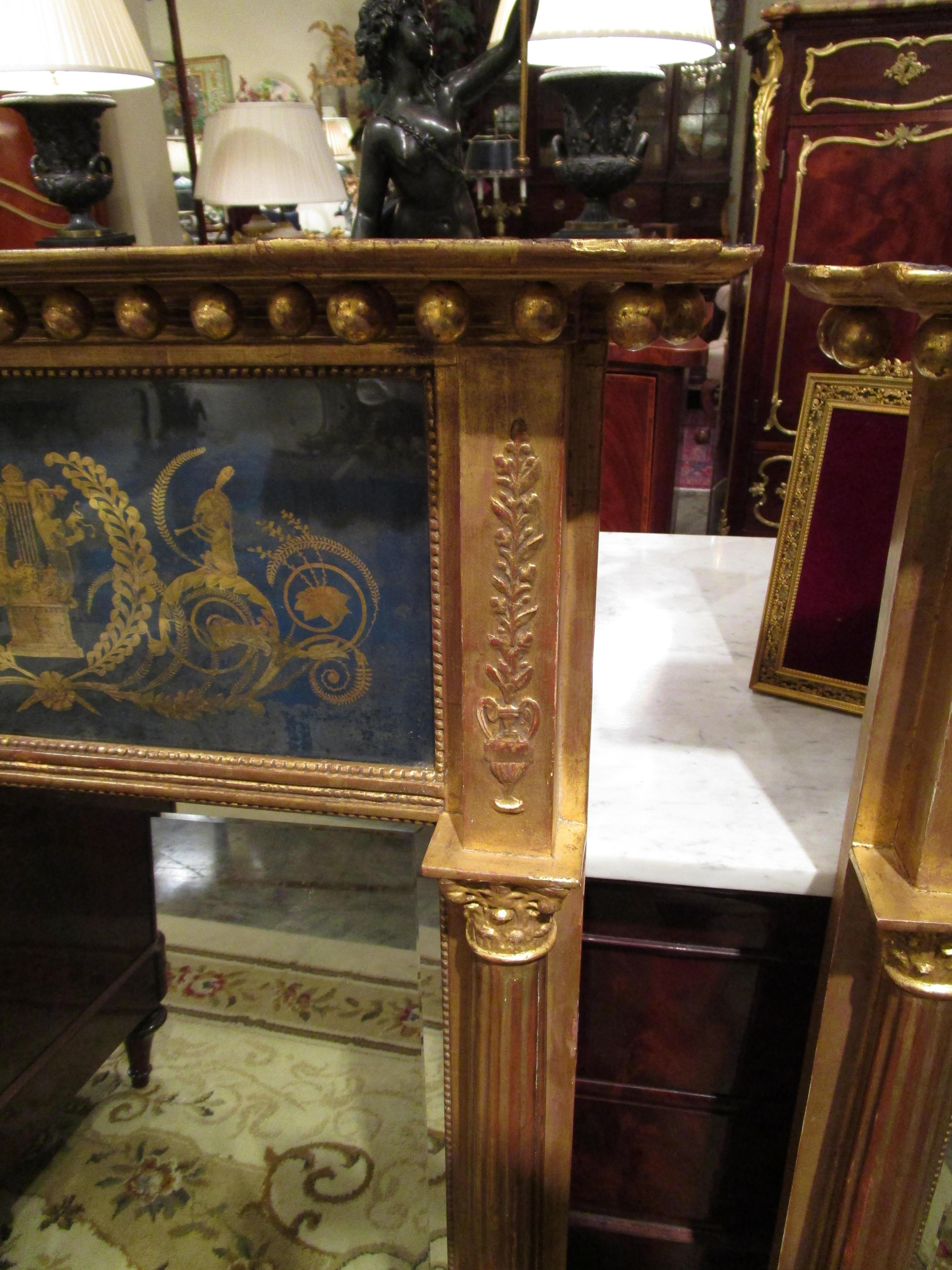 Other Fine Pair of English Regency Gilt Carved and Eglomise Pier Mirrors