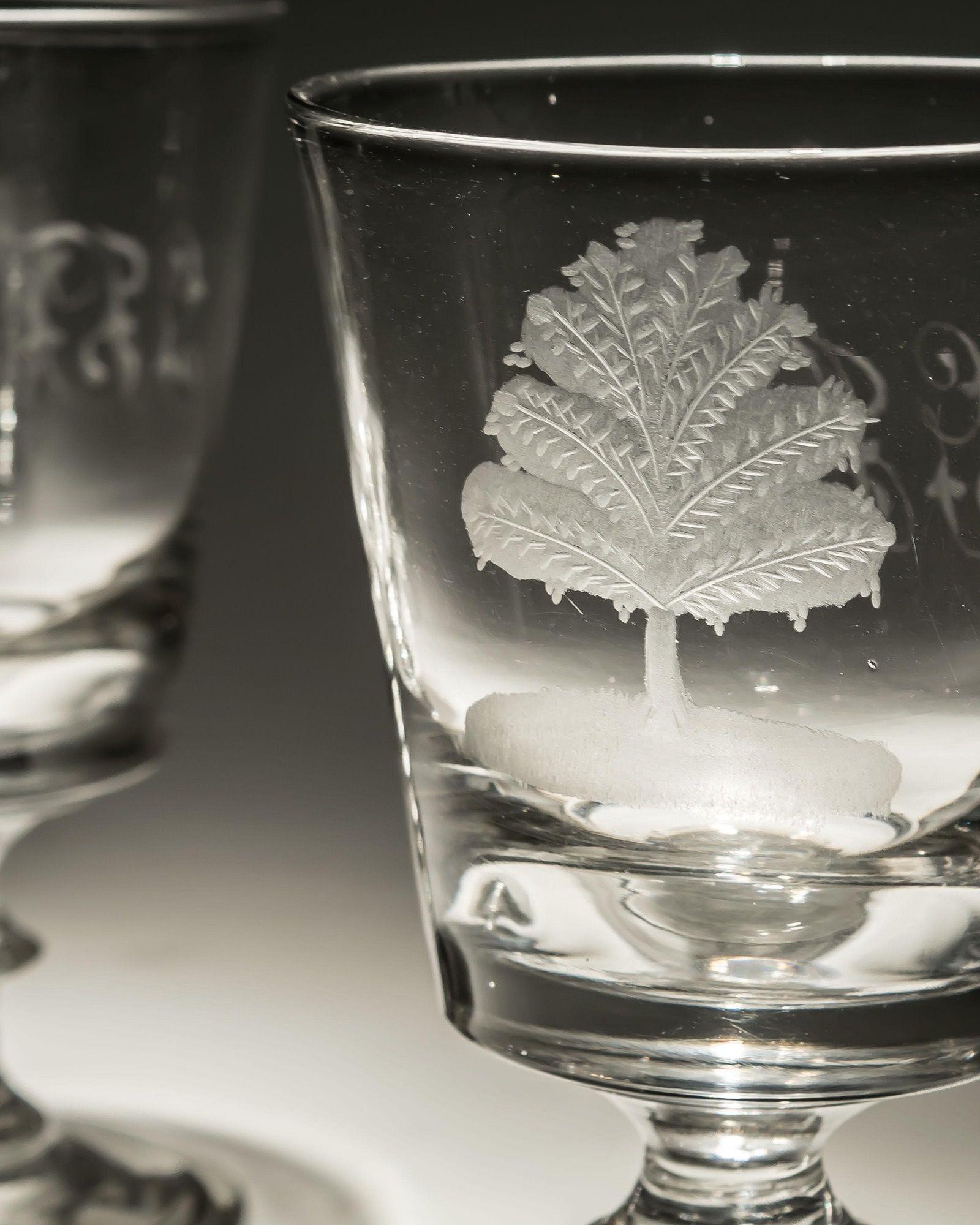 A fine pair of bucket bowl goblets, unusually engraved with a tree and initials GJF.