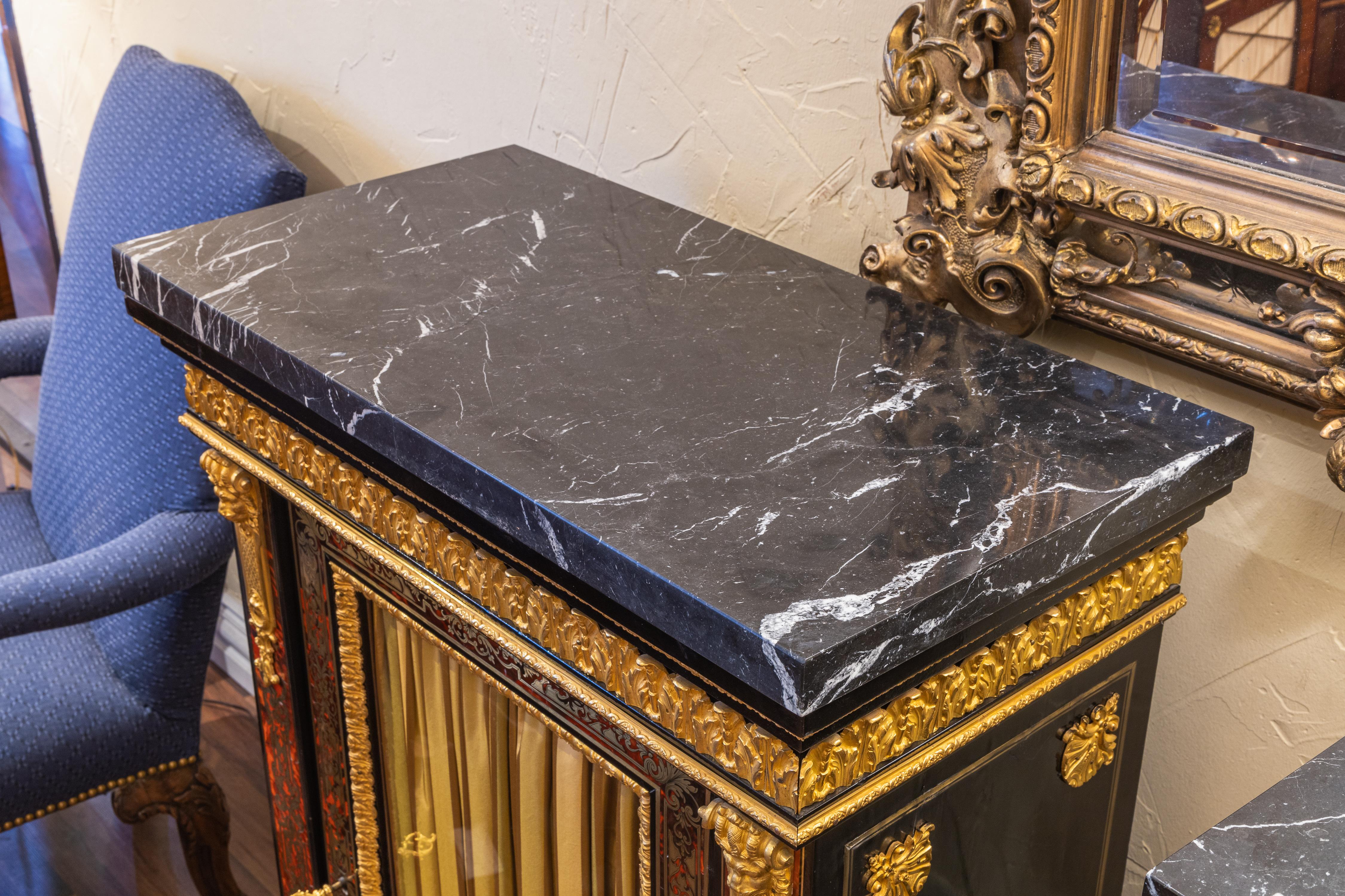 A fine pair of French Boulle and gilt bronze mounted cabinets. Black marble tops For Sale 1
