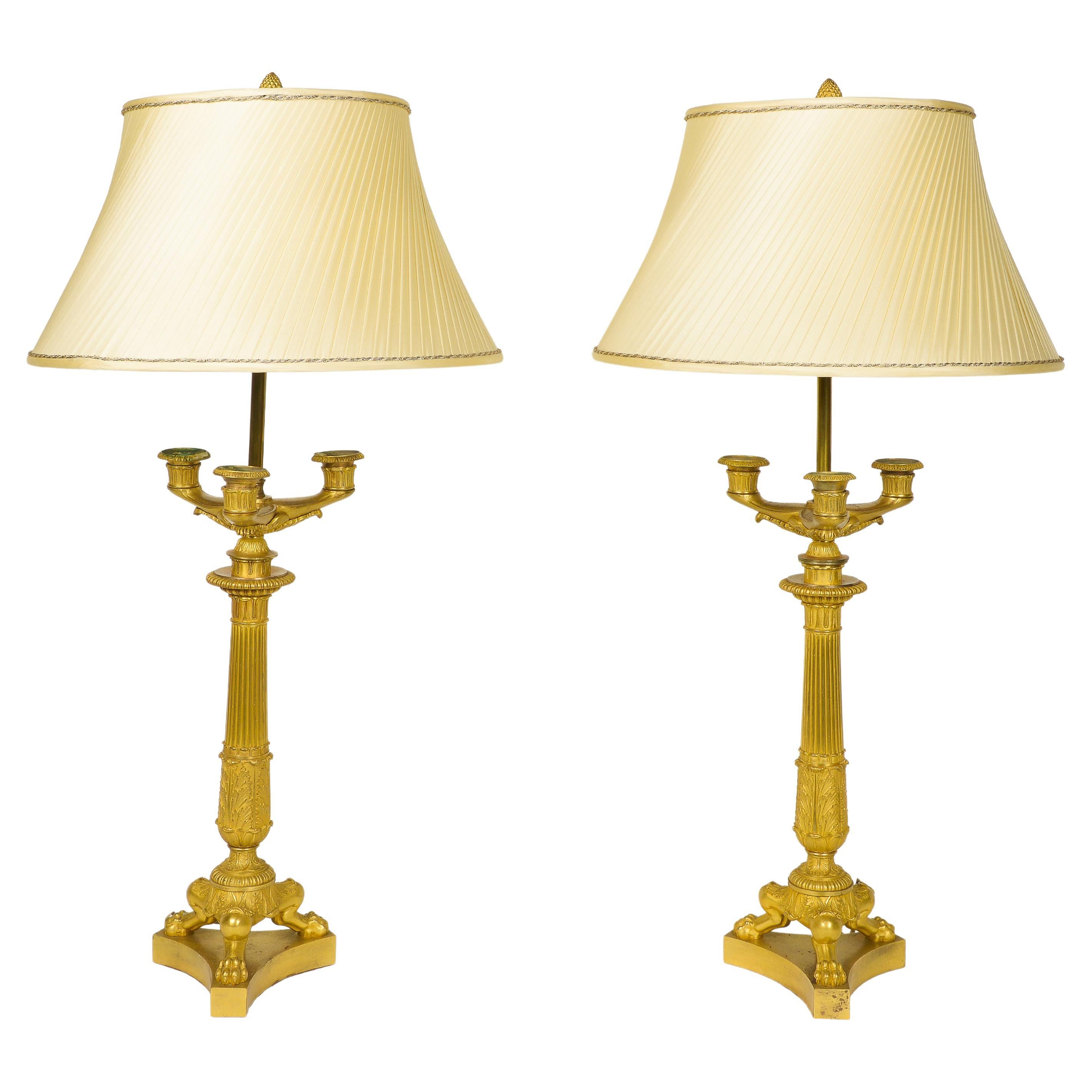 Paire de candélabres français en bronze doré Charles X montés en lampes