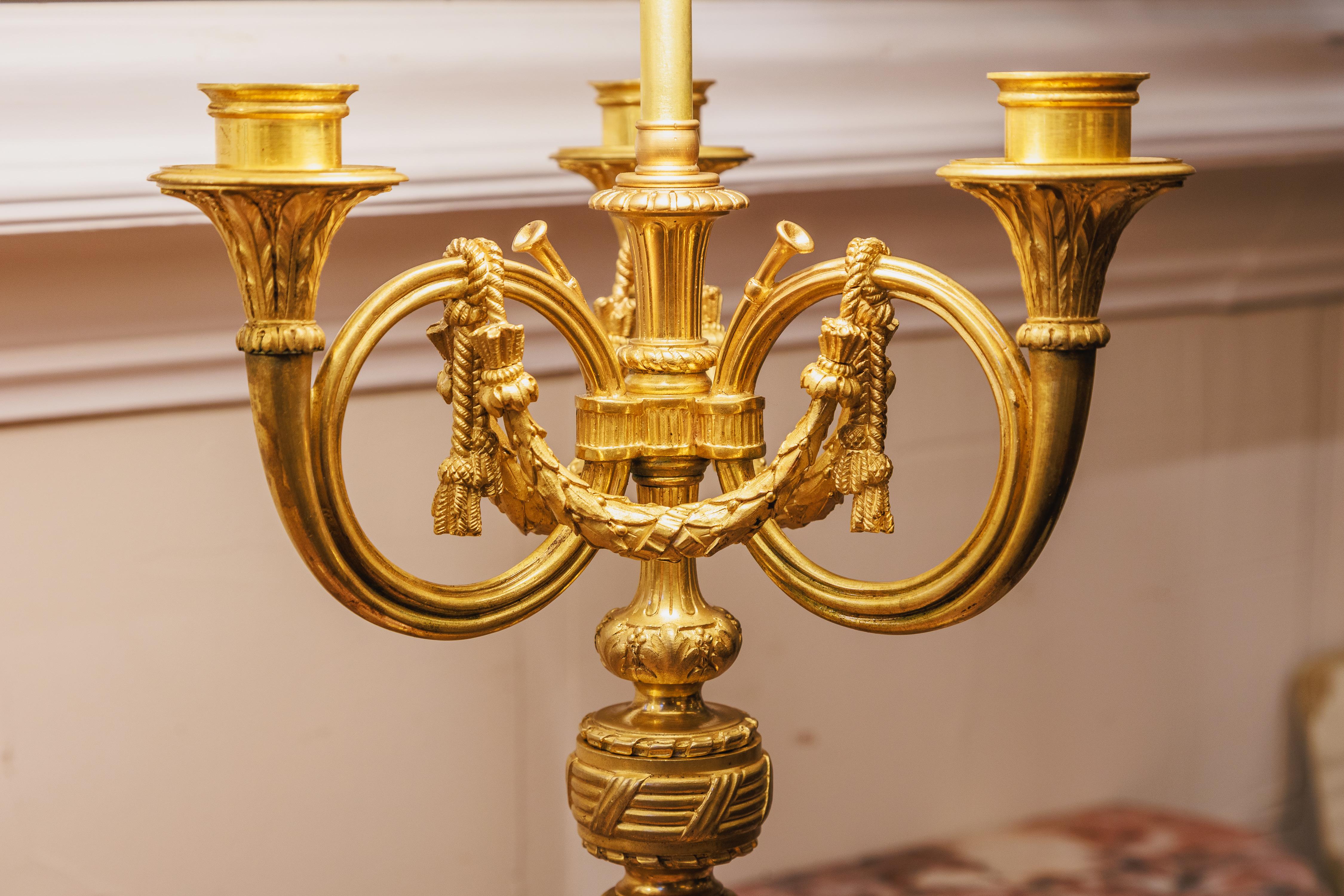 A fine pair of 19th century French Louis XVI gilt bronze bouillette lamps in the Louis XVI style. Fine quality casting.
