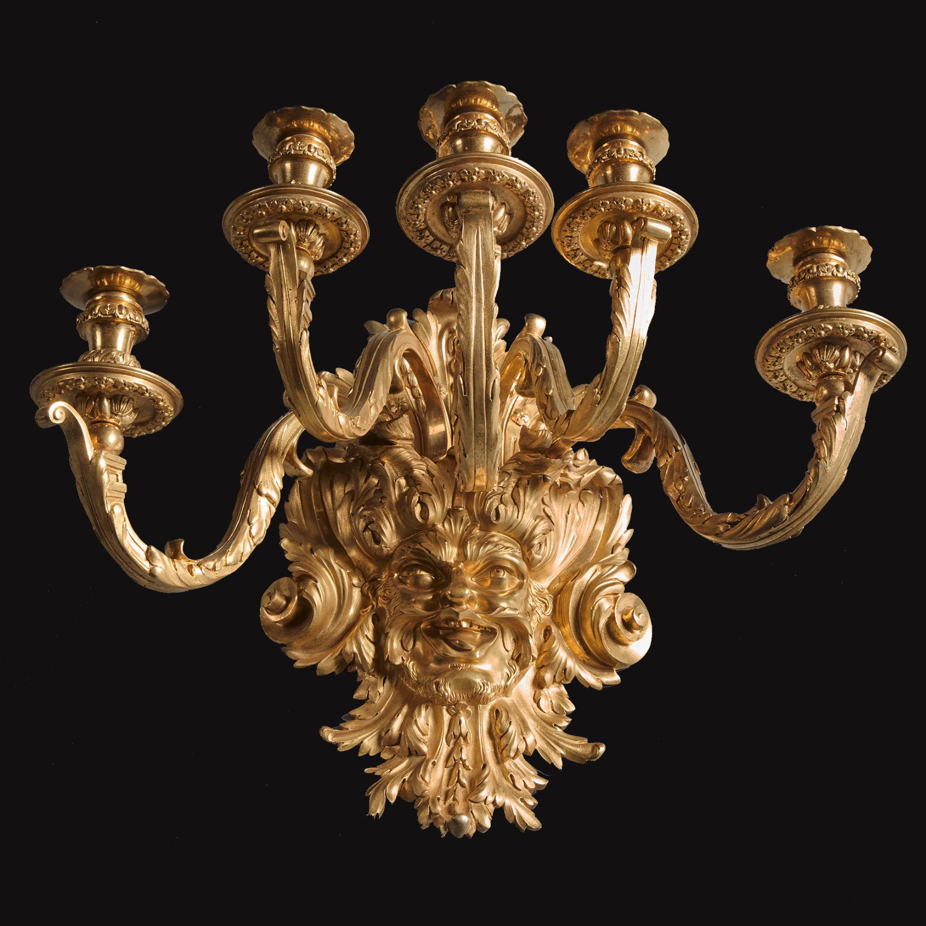 A finely cast pair of gilt-bronze five branch wall lights / wall appliqués in the early 18th Century Regence style by Eugene Hazart, (1838-1891) Paris

French Paris made - Circa 1870

These fine Paris-made wall lights feature five finely-cast