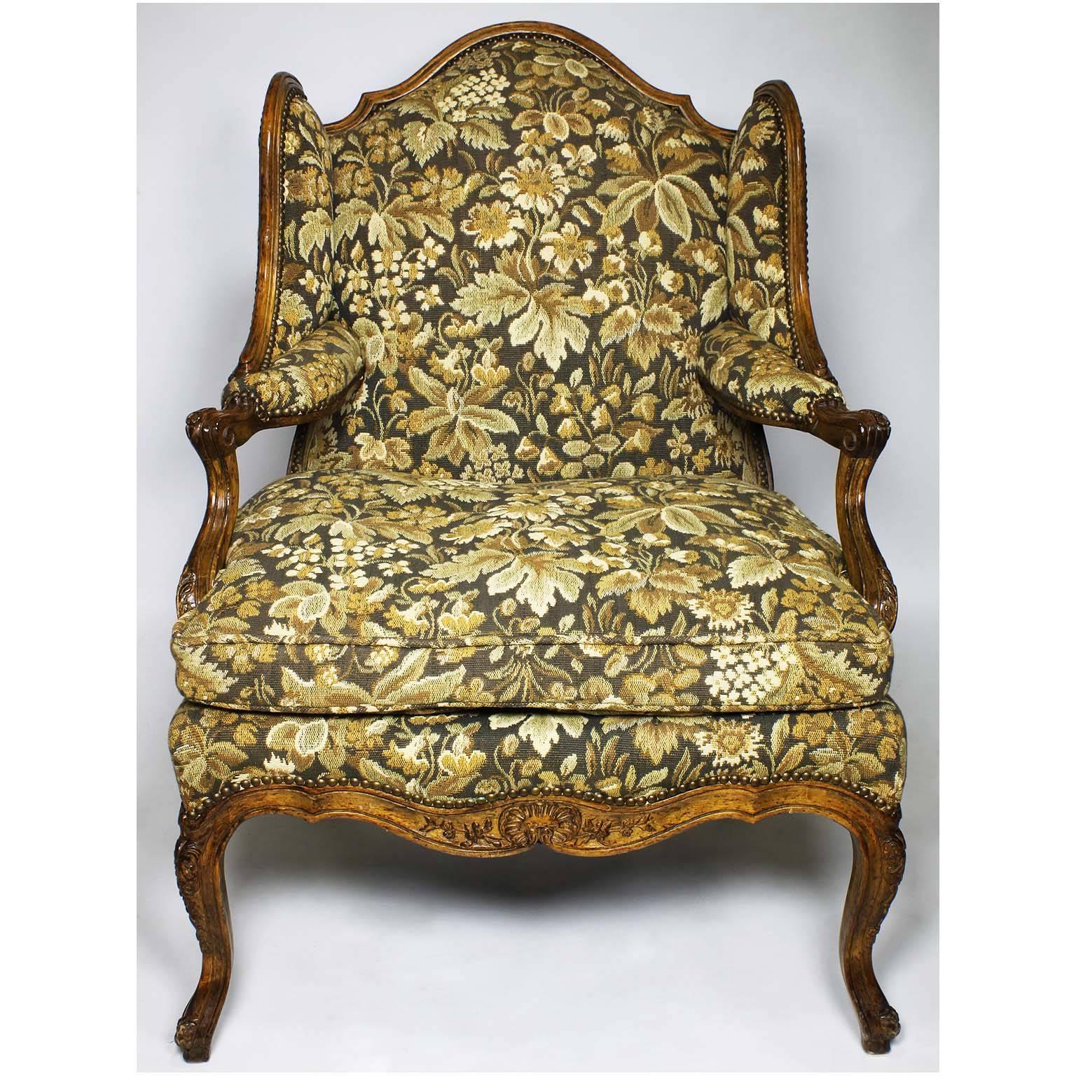 Fine Pair of French Louis XV Style Carved Walnut Wingback Fauteuil Armchairs In Excellent Condition In Los Angeles, CA