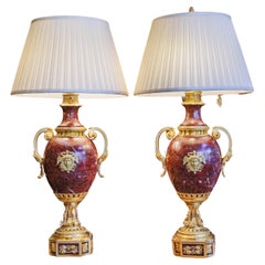 A fine pair of French marble and gilt bronze lamps signed Gaganeau Paris