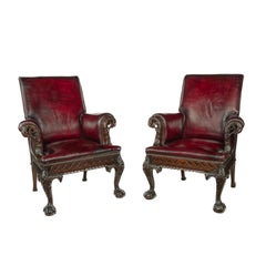 A fine pair of generous late Victorian mahogany eagle armchairs