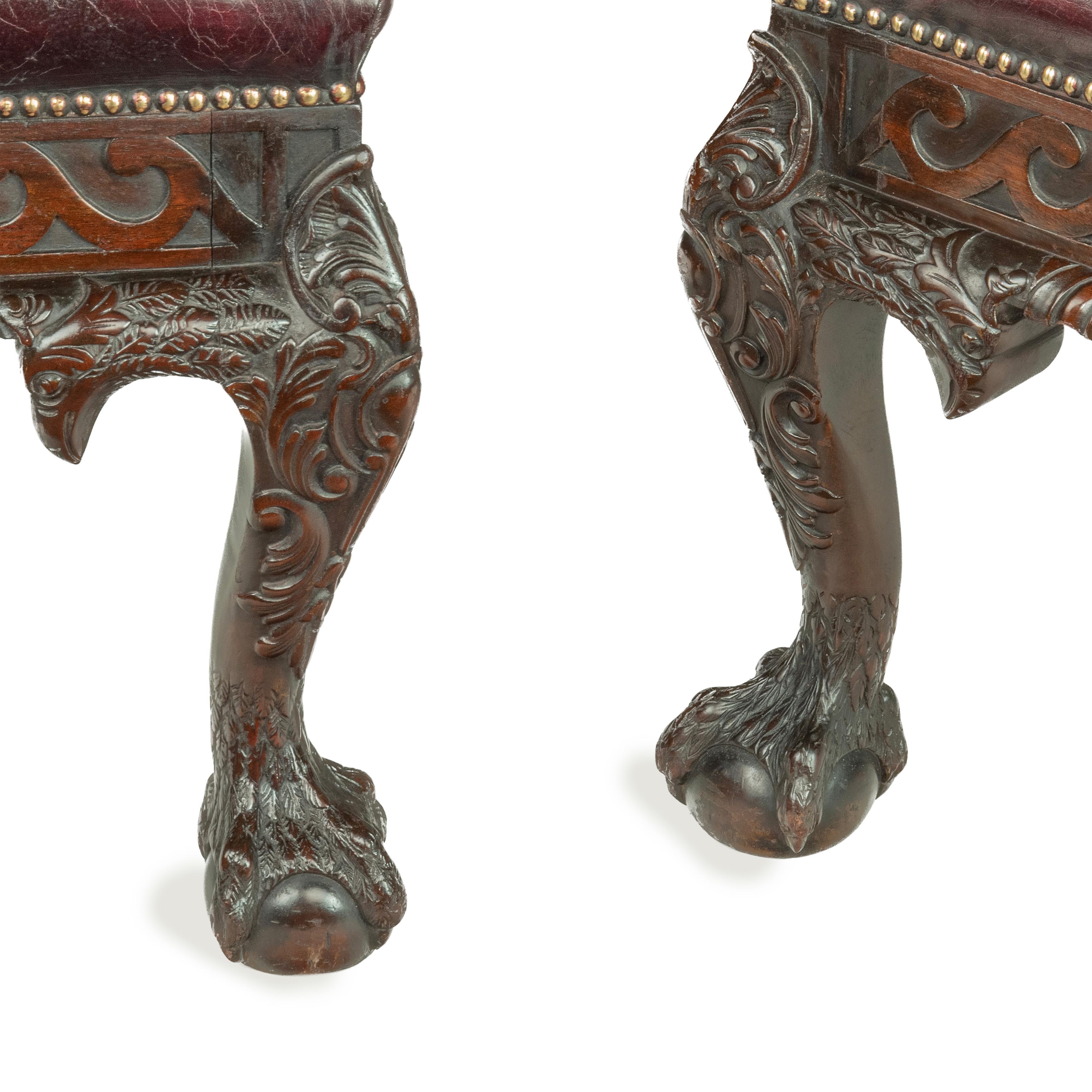 Leather A fine pair of generous late Victorian mahogany eagle armchairs For Sale