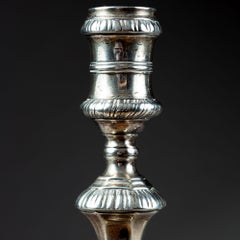 A fine pair of George II silver candlesticks, William Cafe 1758