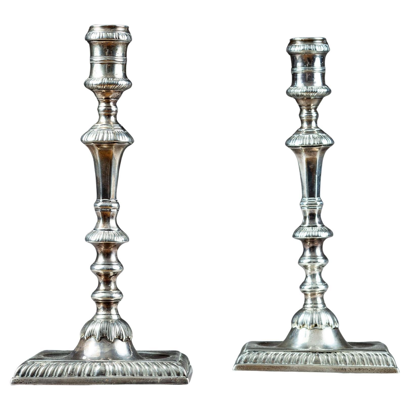 A fine pair of George II silver candlesticks, William Cafe 1758