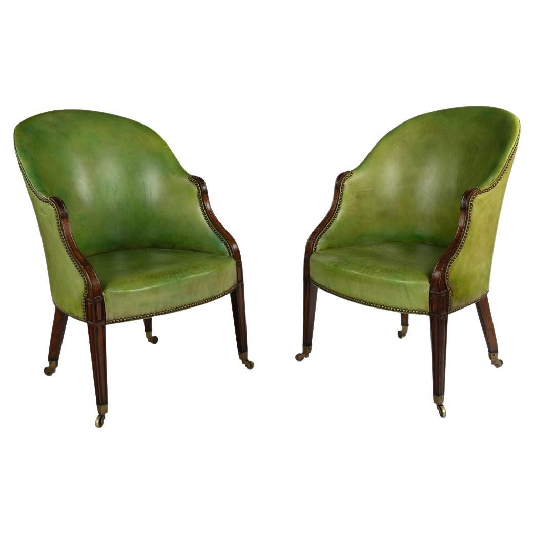 A fine pair of George III Hepplewhite period mahogany tub chairs