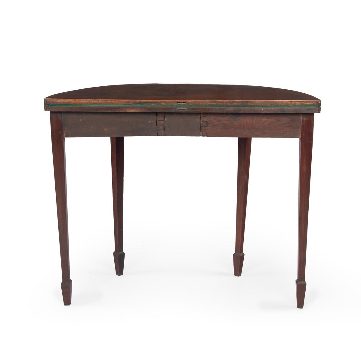 A fine pair of George III period mahogany demilune card tables with provenance Bon état à Lymington, Hampshire