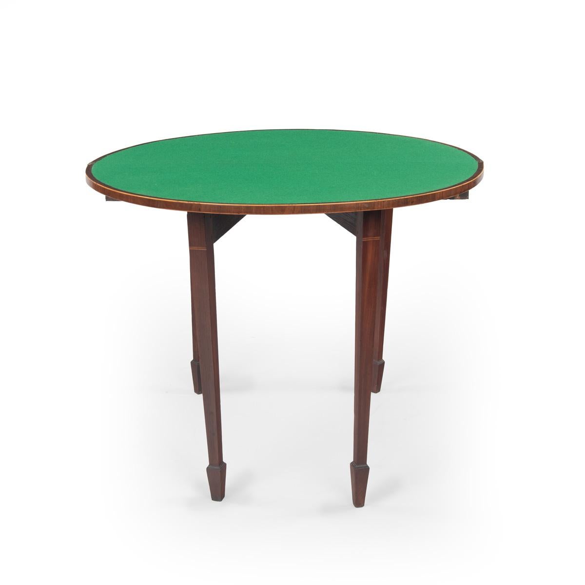 Acajou A fine pair of George III period mahogany demilune card tables with provenance