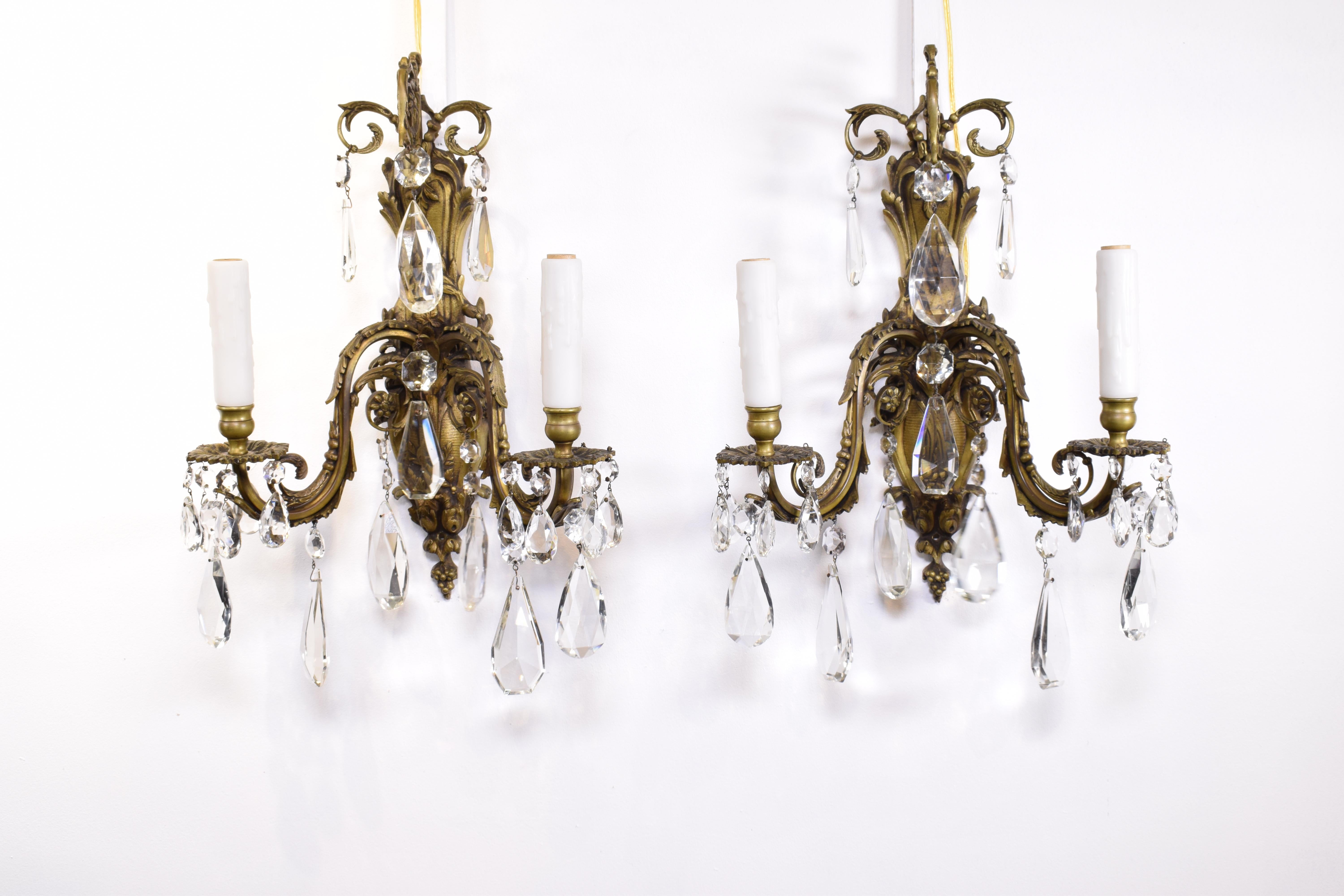 A Fine Pair of Gilt Bronze & Crystal Wall Sconces. 2 lights each. France, circa 1930
Dimensions: Height  18