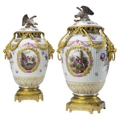 A Fine Pair of Gilt Bronze Mounted Painted Porcelain Vases and Eagle Finial Cove