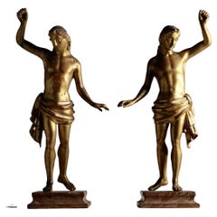 A Fine Pair of Gilt Figures