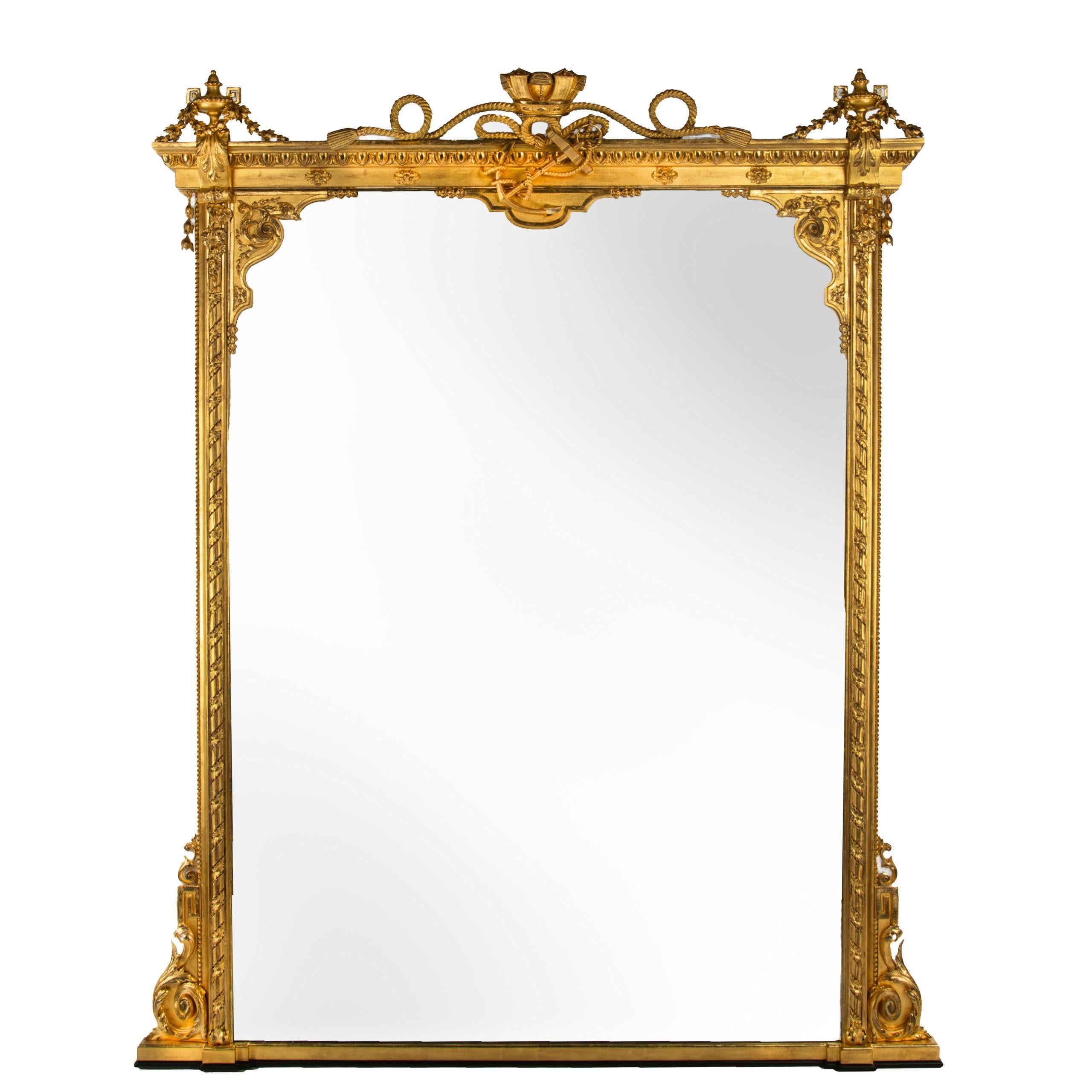 A Fine Pair of Giltwood Overmantel Mirrors with the Emblems of the Royal Naval Club, Portsmouth, Supplied by G. Wendover and Co. in 1869

The mirrors are of imposing size and clean lines-the decoration being more refined and restrained. The