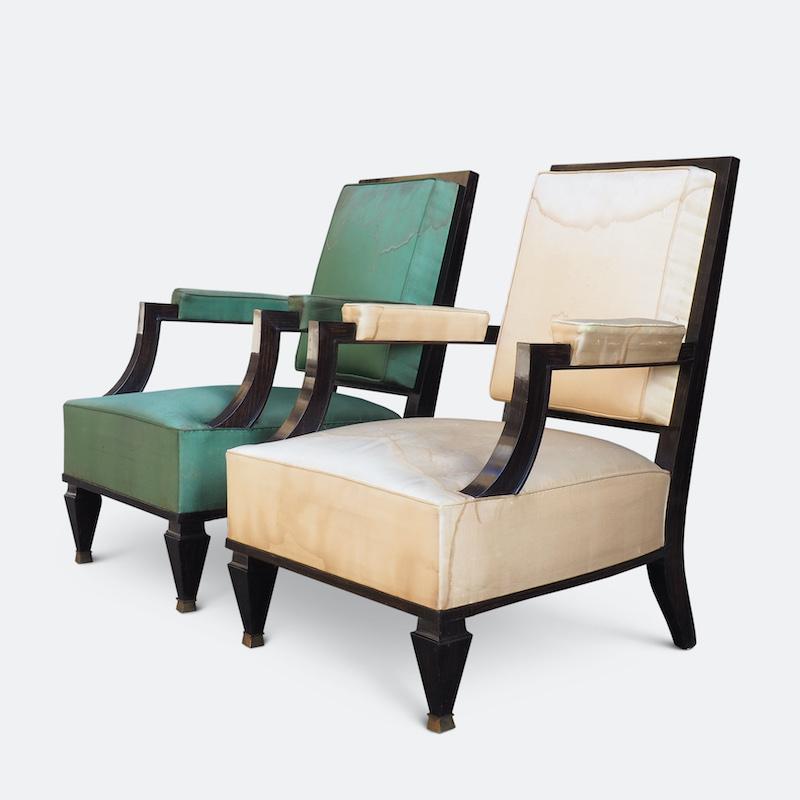 A fine pair of grand armchairs attributed to Andre Arbus 

The distinctive swept arms and tapered legs are Classic Arbus. These chairs are beautifully proportioned with elegant lines and imposing silhouette designed by a master at the height of