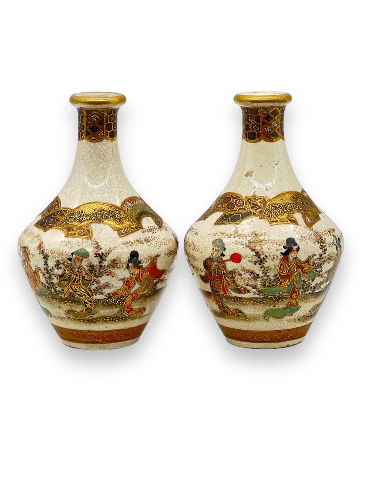 
A Fine Pair of Japanese Satsuma Vases.


Signed to the bottom Yozan.


Meiji Period.


Decorated in satsuma gilt and enamel with a continuous dancing scene of women dancing in traditional kimono. Raised gilt accents, geometrical ornate decoration